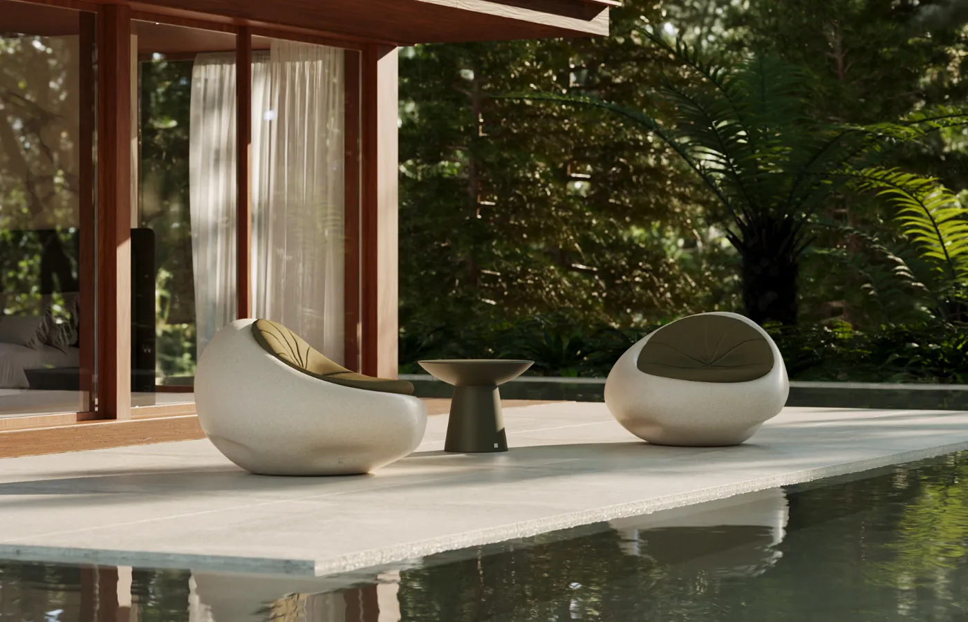 Dois sofás Cobble brancos com formas orgânicas e assentos integrados e mesa de apoio Oceano num terraço junto à piscina.