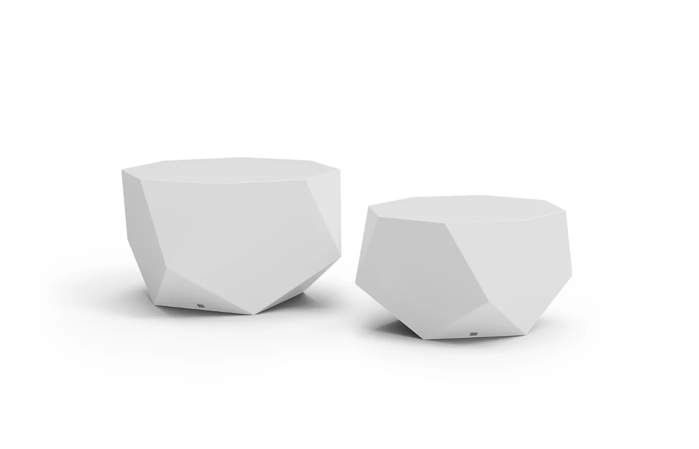 Diamond outdoor side table set in white with faceted forms and a geometric profile, shown isolated against a neutral background.