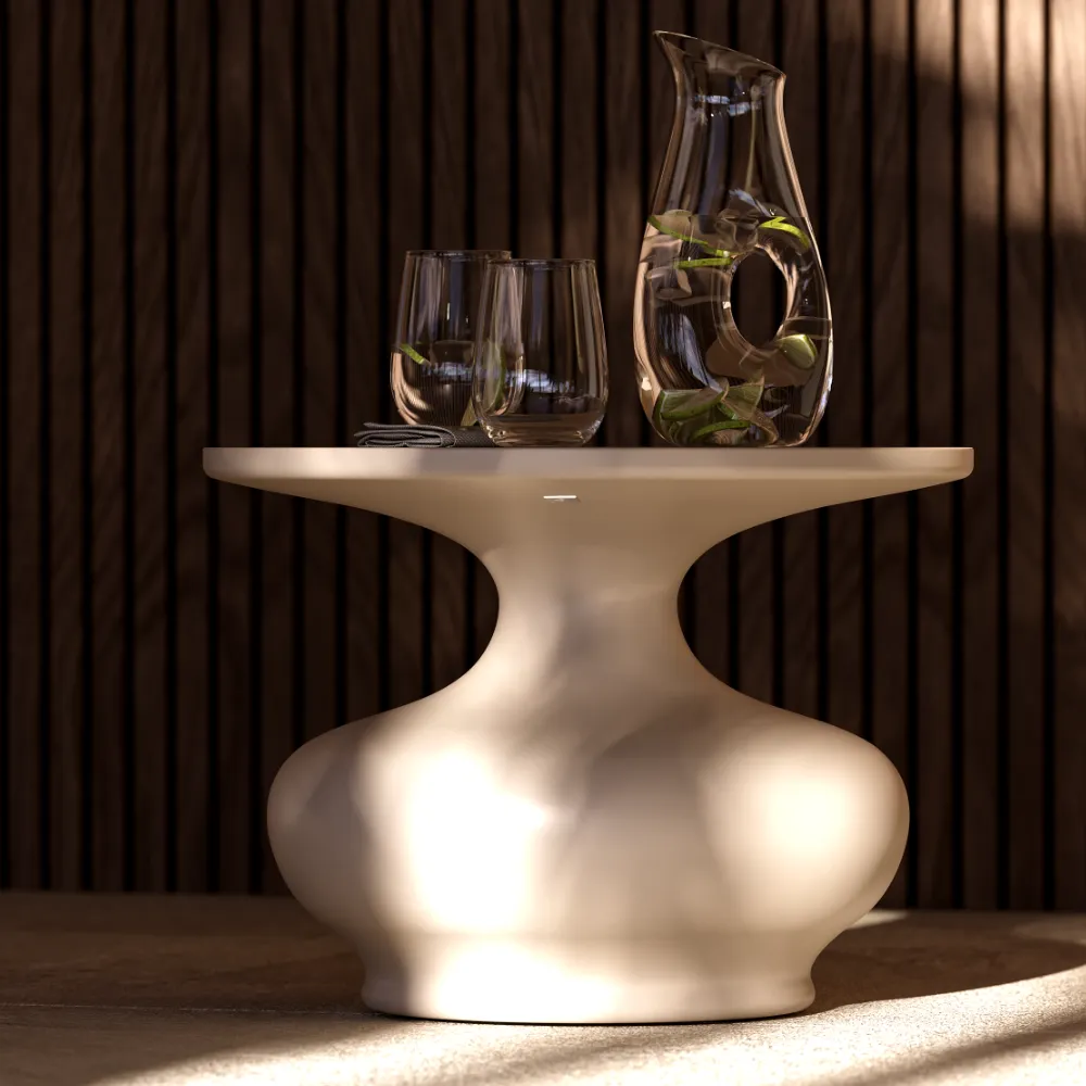 Close-up of the Doris outdoor side table in white, showing the round top and the curved transition into the central base