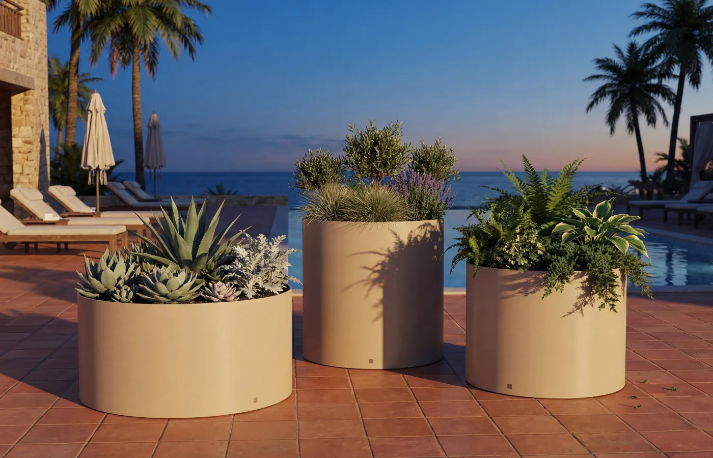 Set of beige Magnus planters in different sizes by the pool, with cylindrical shapes and varied foliage arrangements.