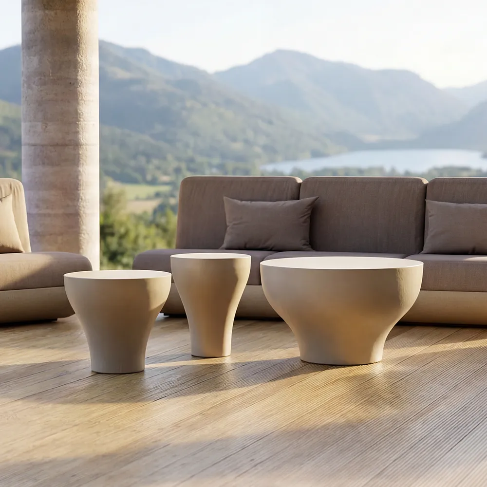 Outdoor terrace featuring a set of white Bloom coffee tables and Victoria sofas